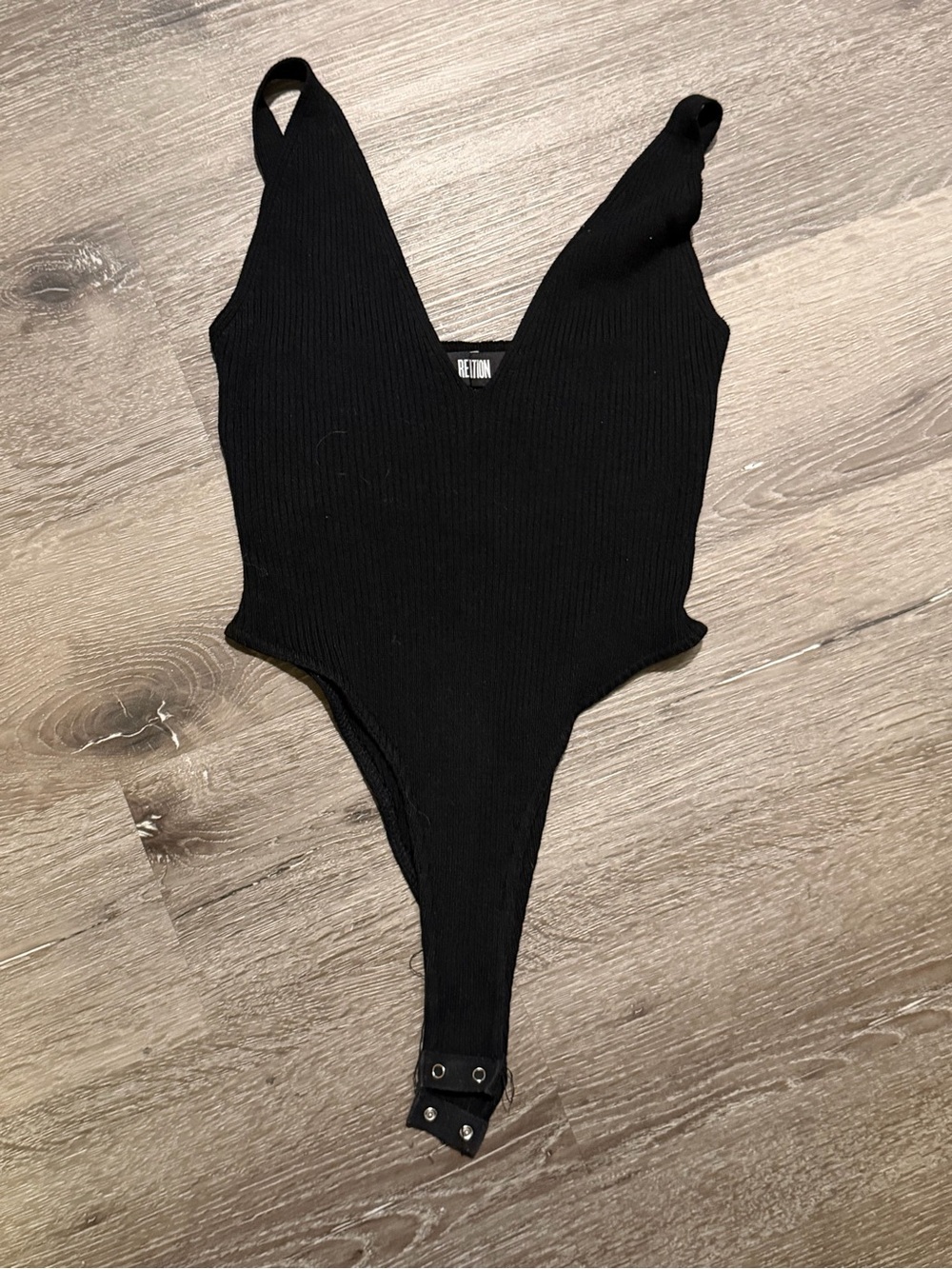 Reformation Black Ribbed V-Neck One-Piece Bodysuit